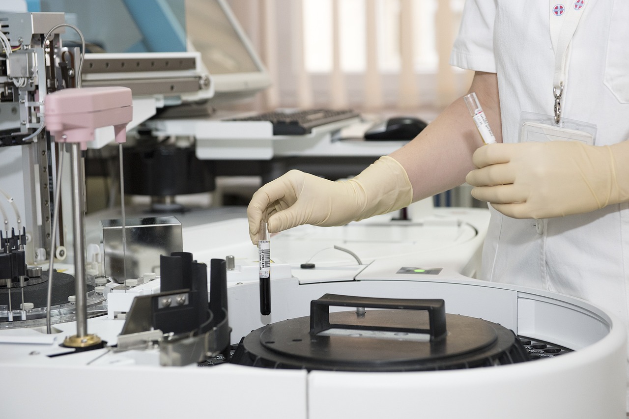 DOT drug tests being placed onto a chemistry analyzer for analysis.