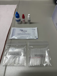 The test kit includes a sealed test device, developer solution, external QC  and sample pipettes. Original Image. 