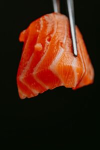 Salmon is a fish which contains no carbs. 